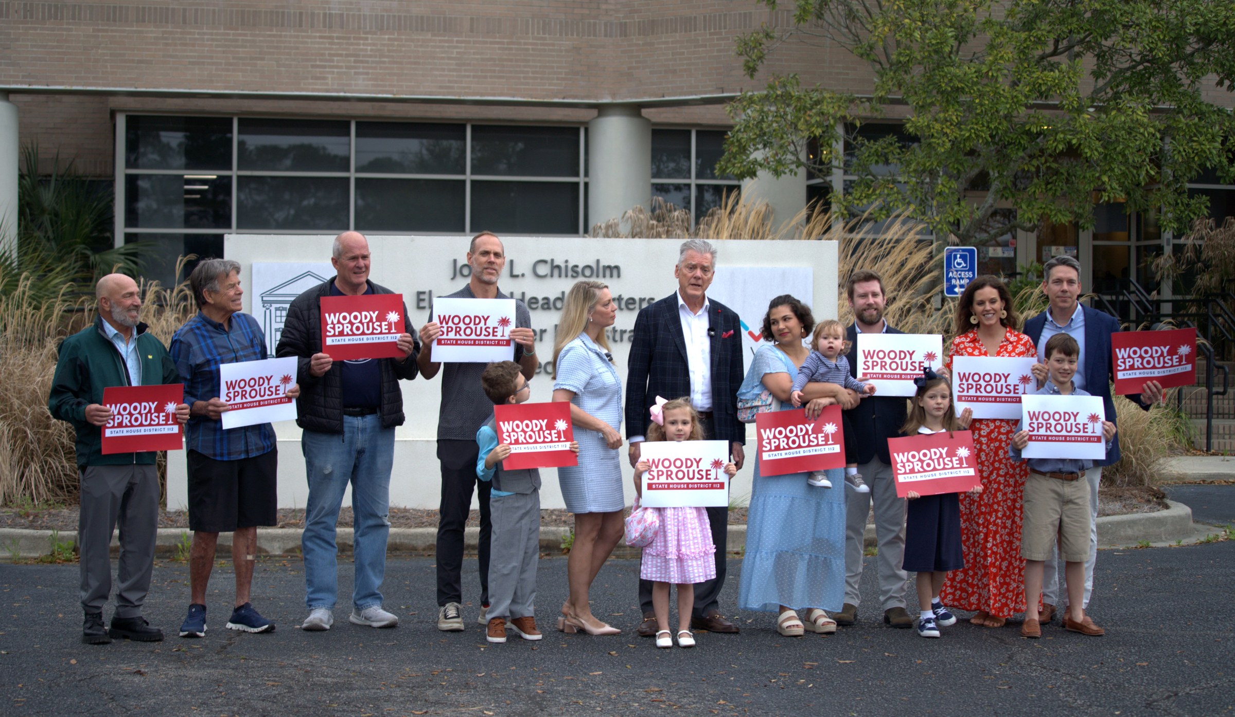 Woody Sprouse with family and supporters at campaign headquarters