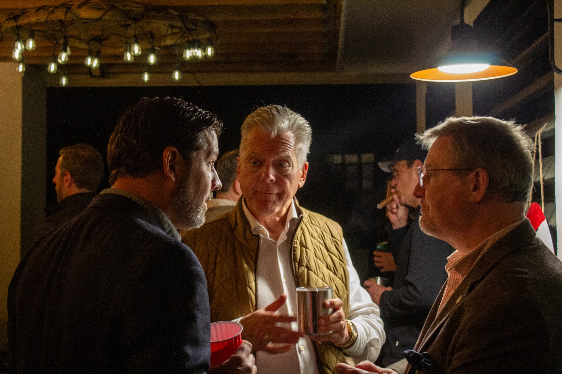 Deep in conversation with supporters after hours