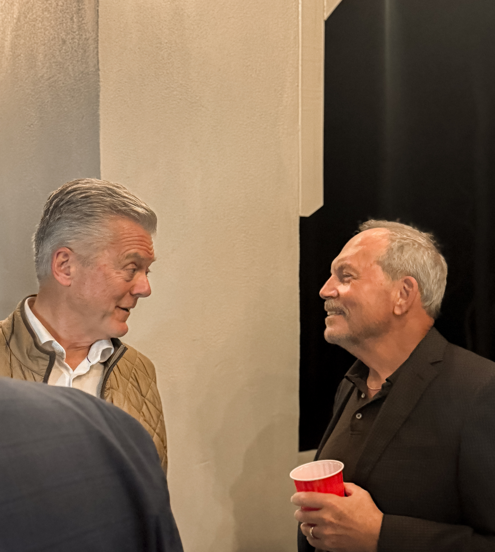 One-on-one with a supporter at an evening gathering