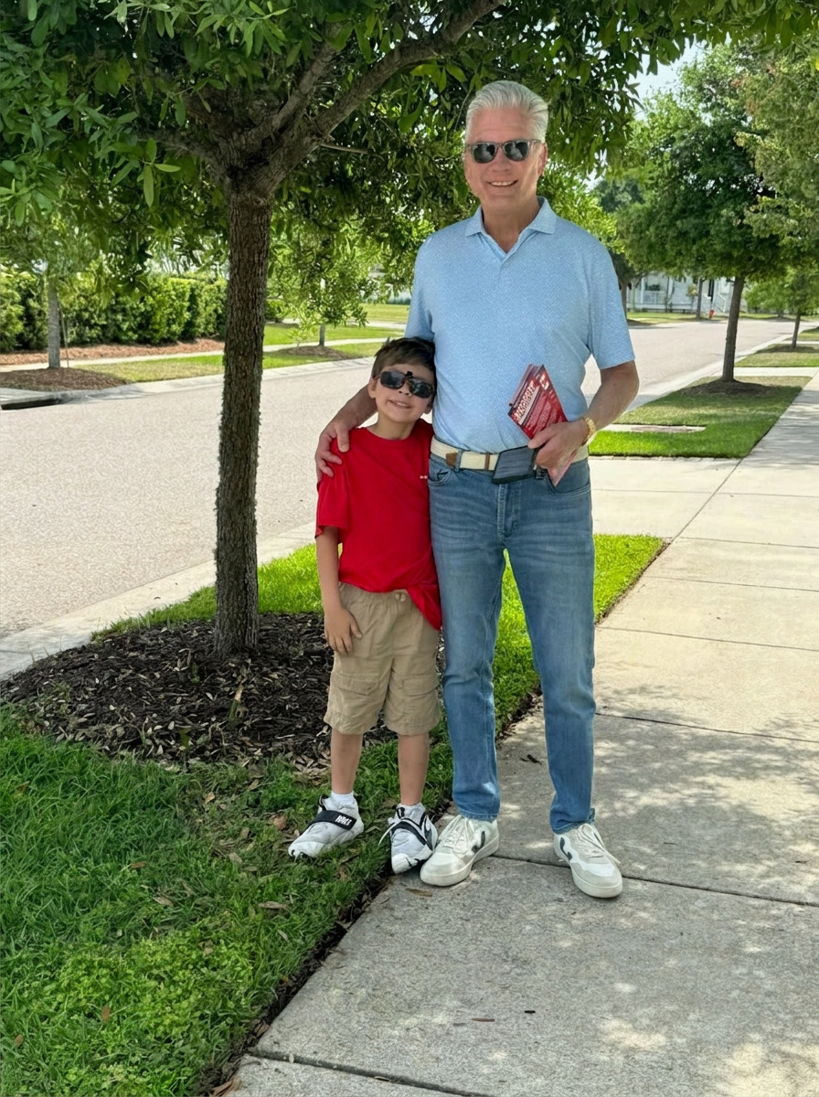 Out listening to neighbors' concerns with my grandson