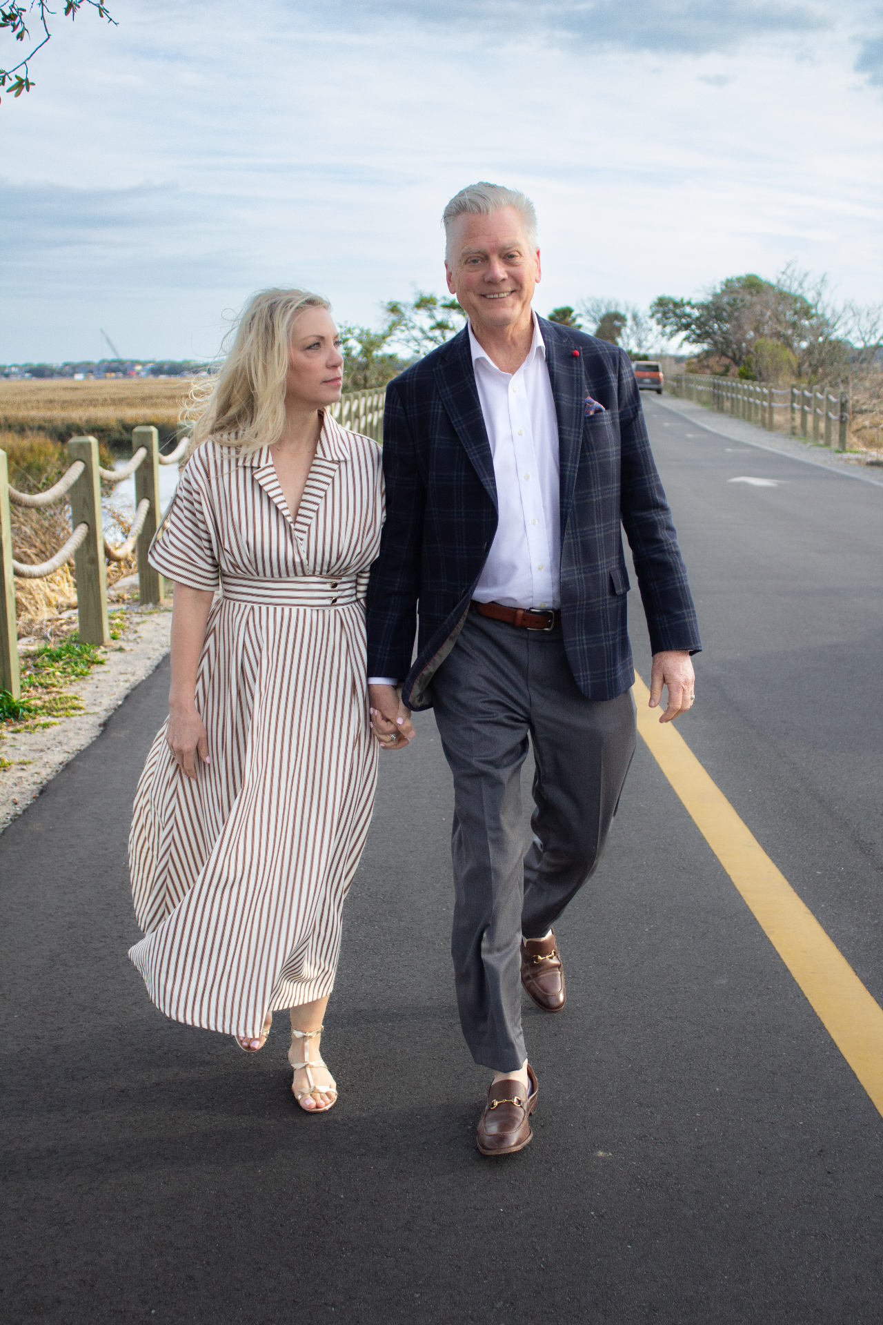 Woody and Debi Sprouse walking along the Lowcountry marsh